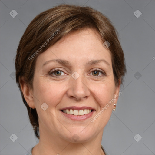 Joyful white adult female with short  brown hair and grey eyes