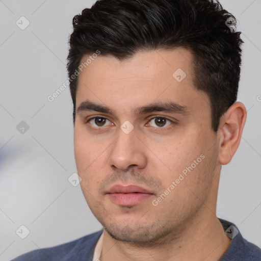 Neutral white young-adult male with short  black hair and brown eyes