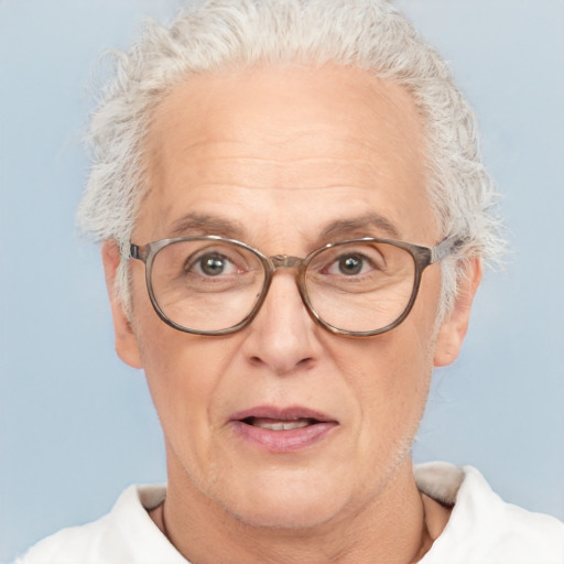 Neutral white middle-aged female with short  gray hair and brown eyes