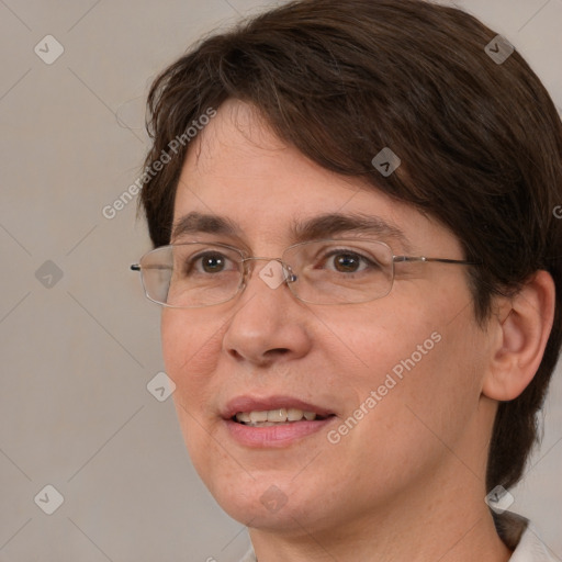 Joyful white adult female with medium  brown hair and brown eyes