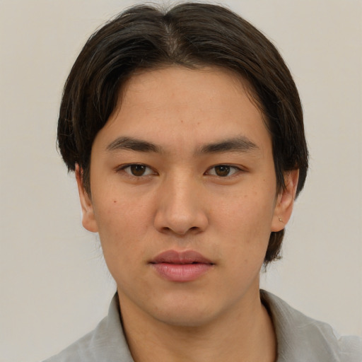 Neutral asian young-adult male with short  brown hair and brown eyes