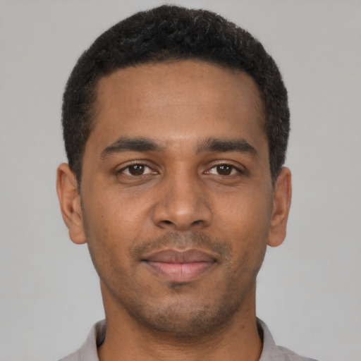 Neutral black young-adult male with short  black hair and brown eyes