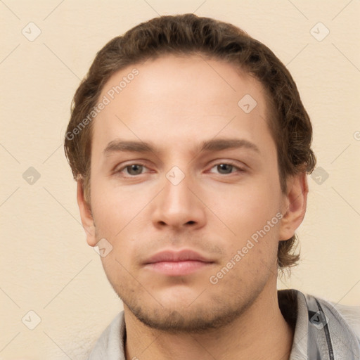 Neutral white young-adult male with short  brown hair and brown eyes