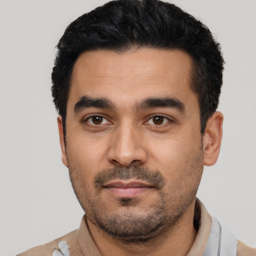 Neutral latino young-adult male with short  black hair and brown eyes