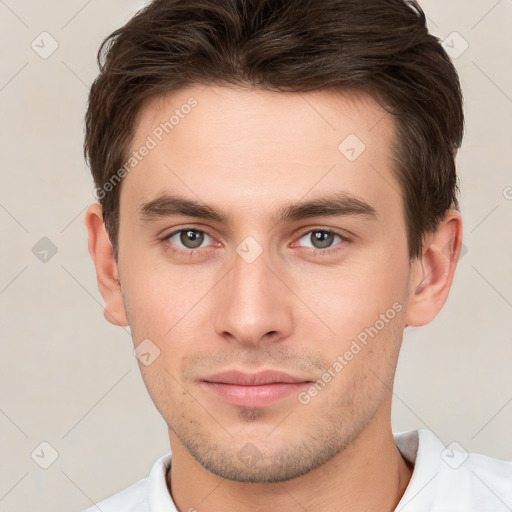 Neutral white young-adult male with short  brown hair and brown eyes