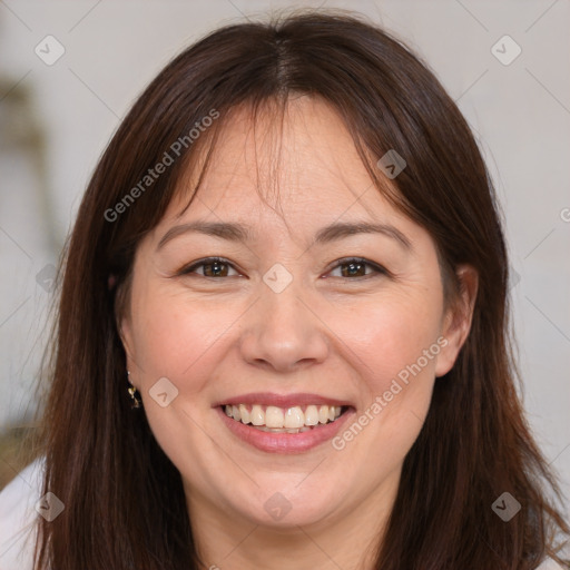 Joyful white adult female with long  brown hair and brown eyes