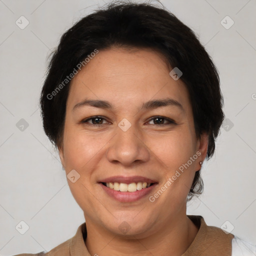 Joyful white adult female with short  brown hair and brown eyes