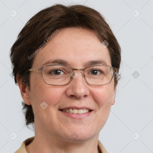 Joyful white adult female with short  brown hair and grey eyes