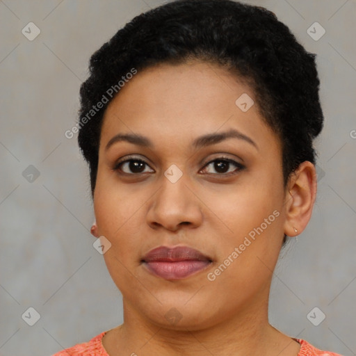 Joyful black young-adult female with short  black hair and brown eyes