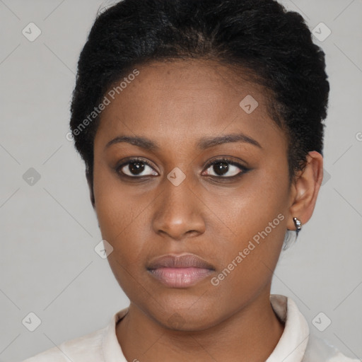 Neutral black young-adult female with short  brown hair and brown eyes