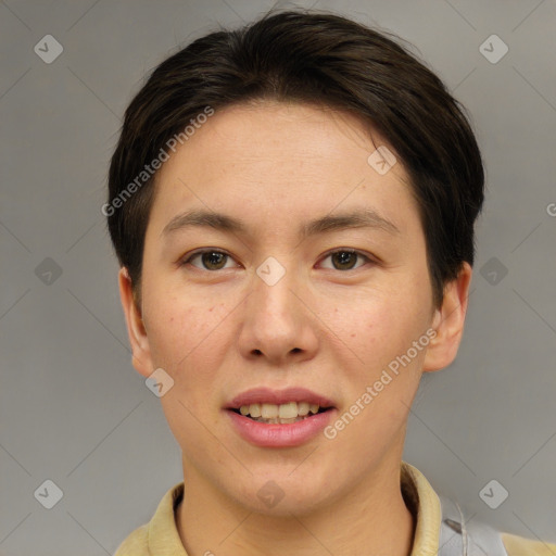 Joyful asian young-adult female with short  brown hair and brown eyes