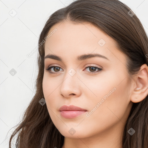 Neutral white young-adult female with long  brown hair and brown eyes