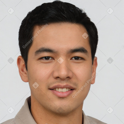 Joyful asian young-adult male with short  brown hair and brown eyes