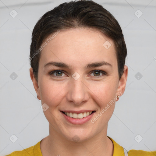 Joyful white young-adult female with short  brown hair and grey eyes