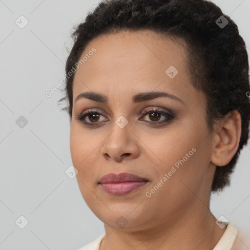 Joyful latino young-adult female with short  brown hair and brown eyes