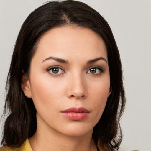 Neutral white young-adult female with medium  brown hair and brown eyes