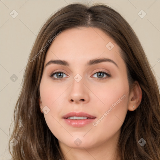 Neutral white young-adult female with long  brown hair and brown eyes