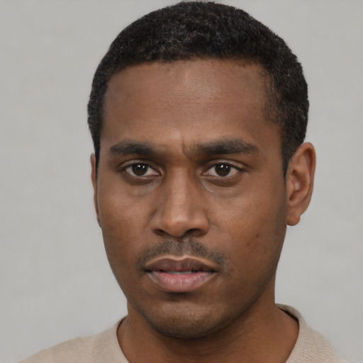 Neutral black young-adult male with short  black hair and brown eyes