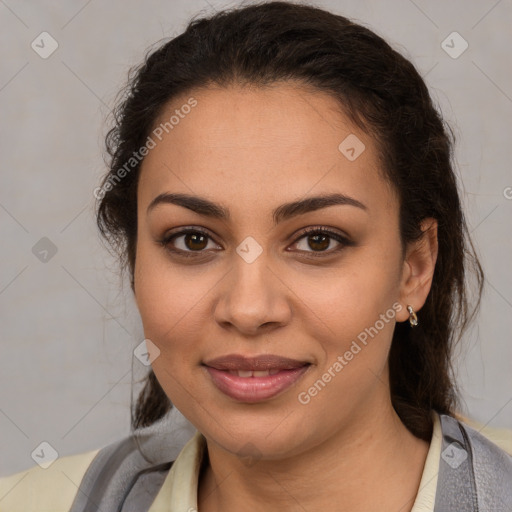 Joyful latino young-adult female with medium  brown hair and brown eyes