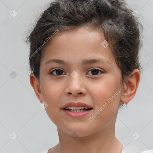 Joyful white child female with short  brown hair and brown eyes