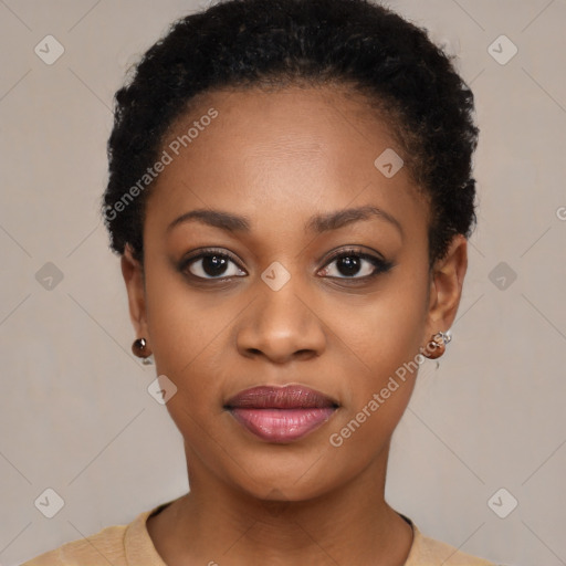 Joyful black young-adult female with short  black hair and brown eyes