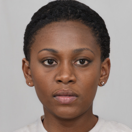 Neutral black young-adult female with short  black hair and brown eyes