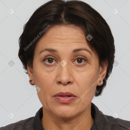 Joyful white adult female with medium  brown hair and brown eyes