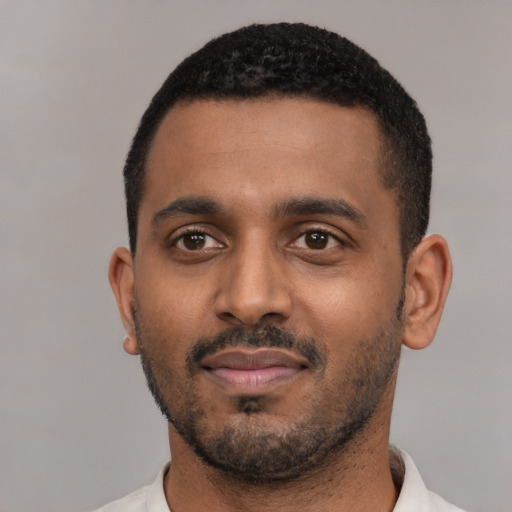 Neutral black young-adult male with short  black hair and brown eyes