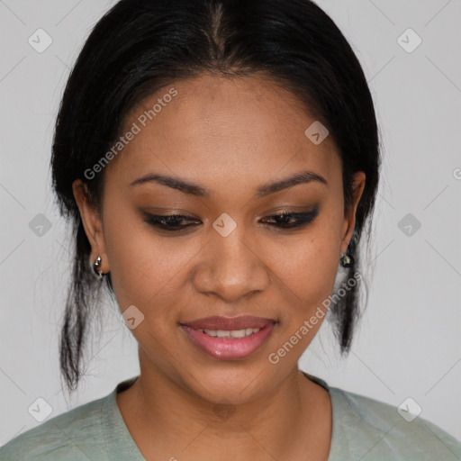 Joyful latino young-adult female with medium  brown hair and brown eyes