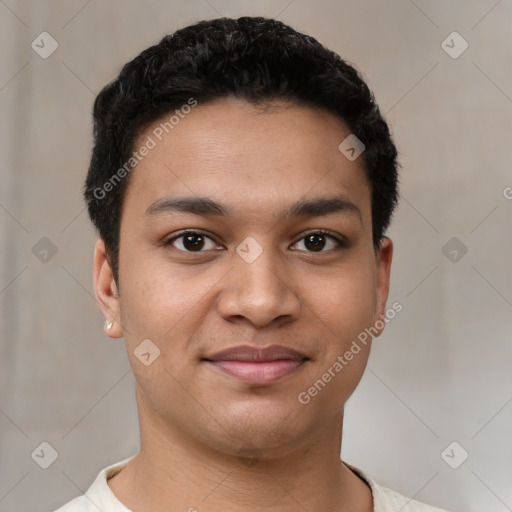 Joyful latino young-adult male with short  black hair and brown eyes