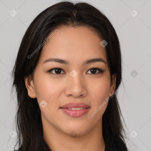 Joyful latino young-adult female with long  brown hair and brown eyes