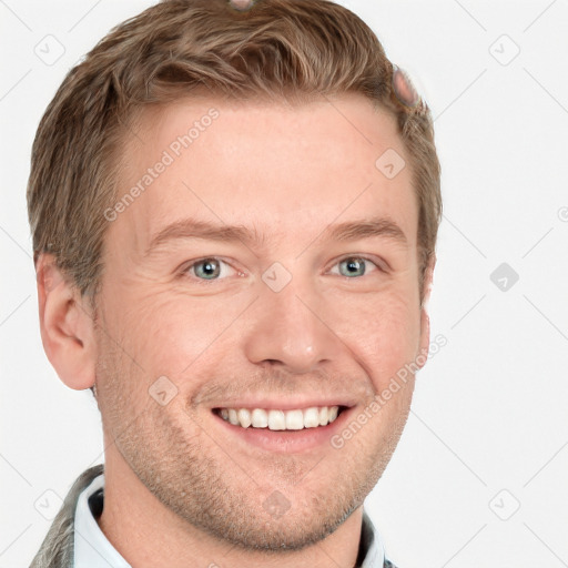 Joyful white adult male with short  brown hair and grey eyes