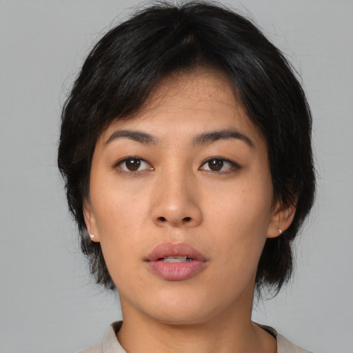 Neutral asian young-adult female with medium  black hair and brown eyes