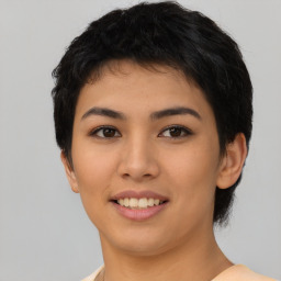 Joyful asian young-adult female with short  black hair and brown eyes