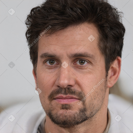 Neutral white adult male with short  brown hair and brown eyes