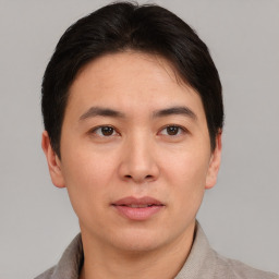 Neutral asian young-adult male with short  brown hair and brown eyes