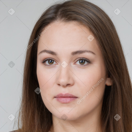 Neutral white young-adult female with long  brown hair and brown eyes