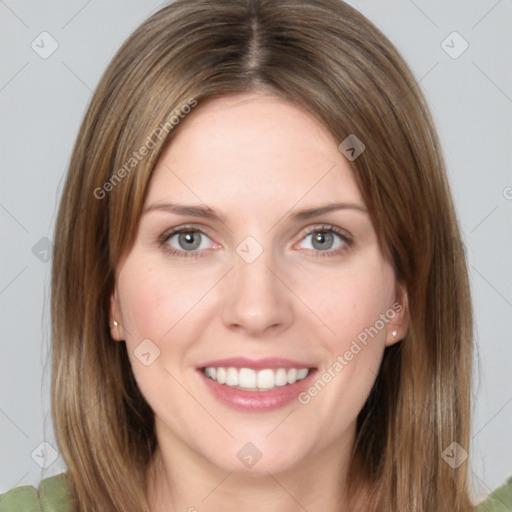 Joyful white young-adult female with medium  brown hair and green eyes