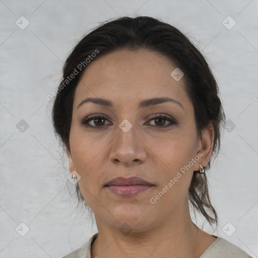 Joyful white adult female with medium  brown hair and brown eyes