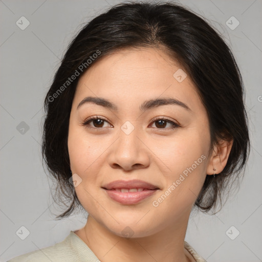 Joyful asian young-adult female with medium  brown hair and brown eyes