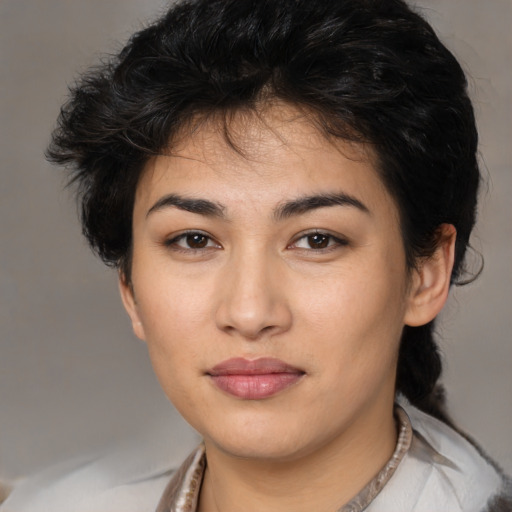 Joyful white young-adult female with medium  black hair and brown eyes