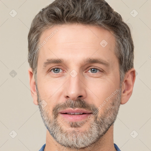 Neutral white adult male with short  brown hair and brown eyes