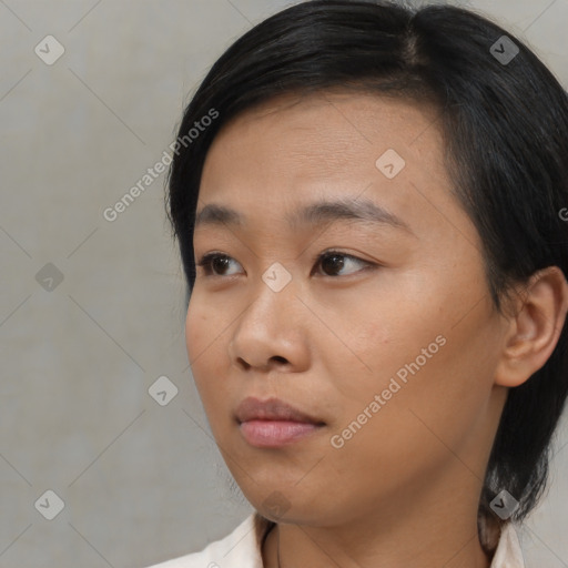 Neutral asian young-adult female with medium  black hair and brown eyes