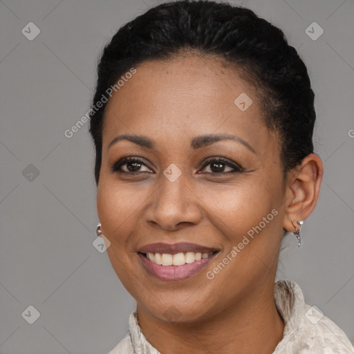 Joyful latino young-adult female with medium  brown hair and brown eyes