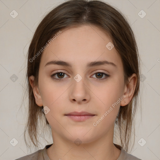 Neutral white young-adult female with medium  brown hair and brown eyes