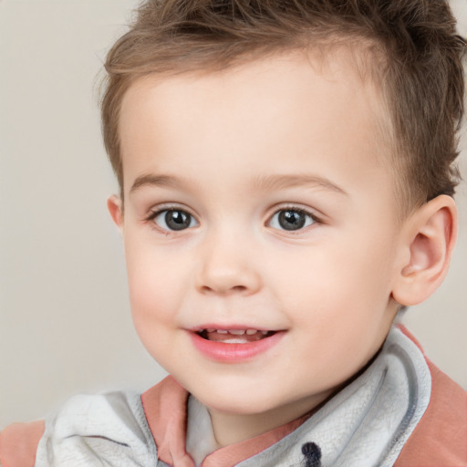 Joyful white child female with short  brown hair and brown eyes