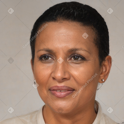 Joyful black adult female with short  brown hair and brown eyes