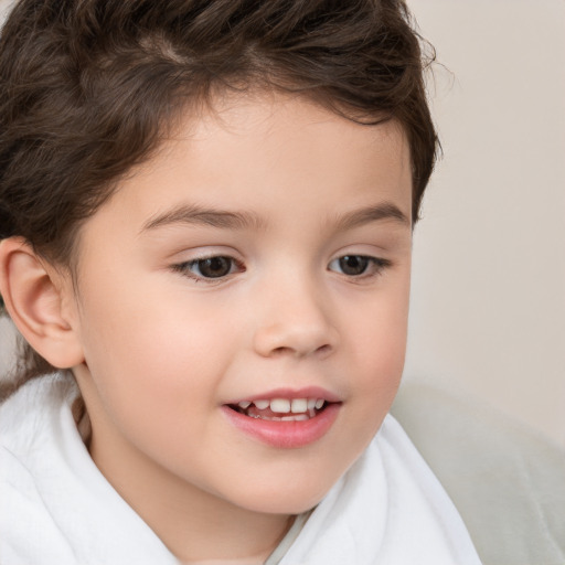 Joyful white child female with short  brown hair and brown eyes