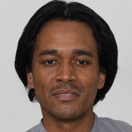 Neutral asian adult male with short  black hair and brown eyes