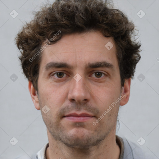 Neutral white adult male with short  brown hair and brown eyes